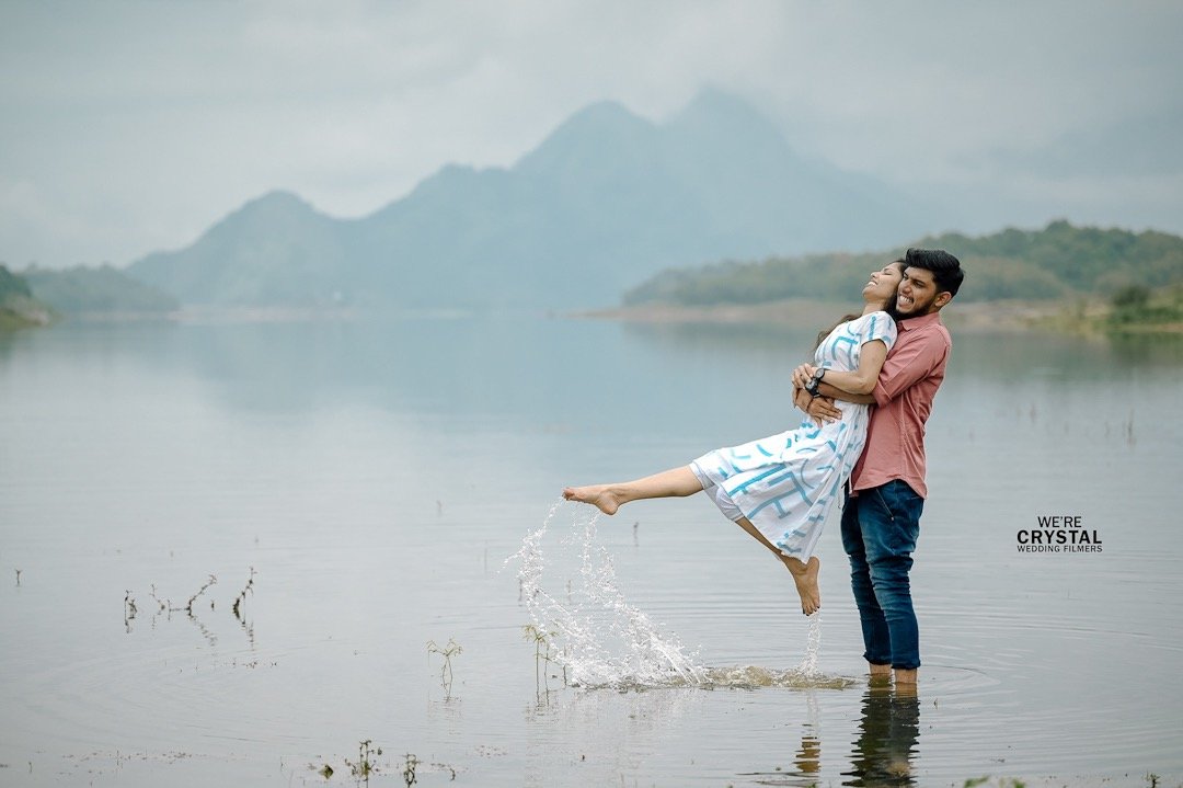 Couple portrait by the water during a pre-wedding shoot