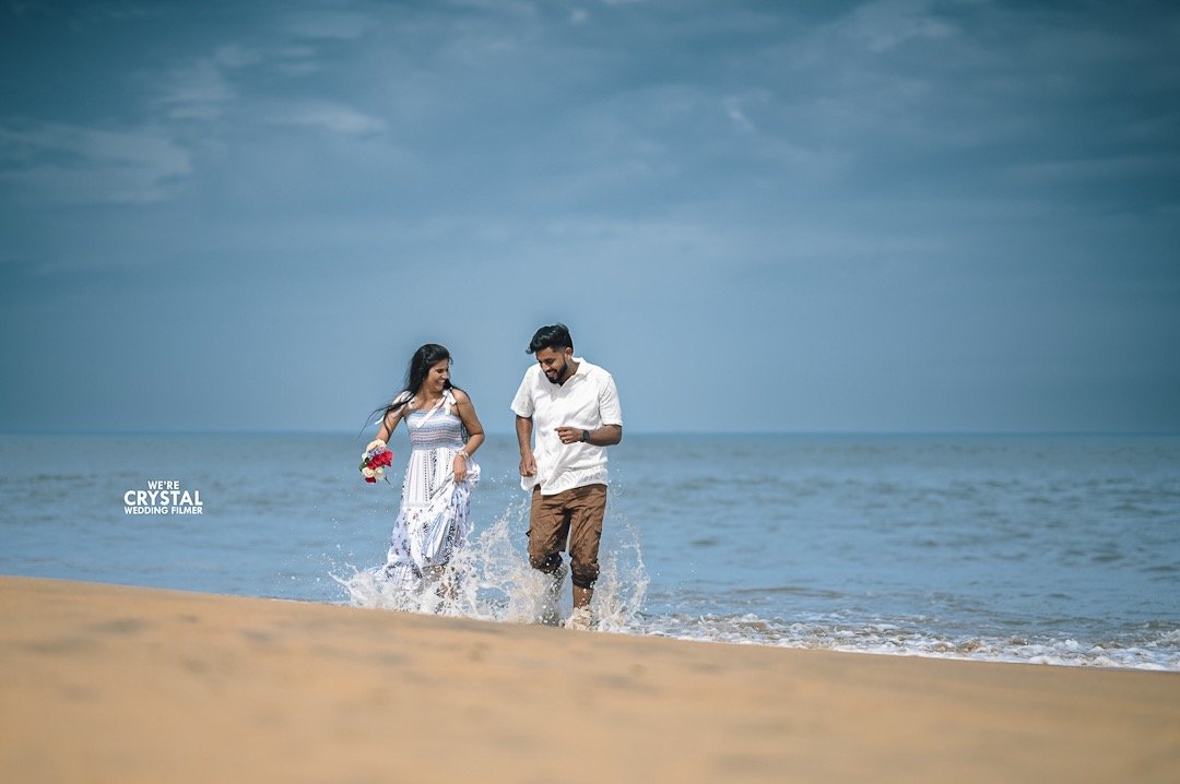 Candid laughing couple during pre-wedding photography
